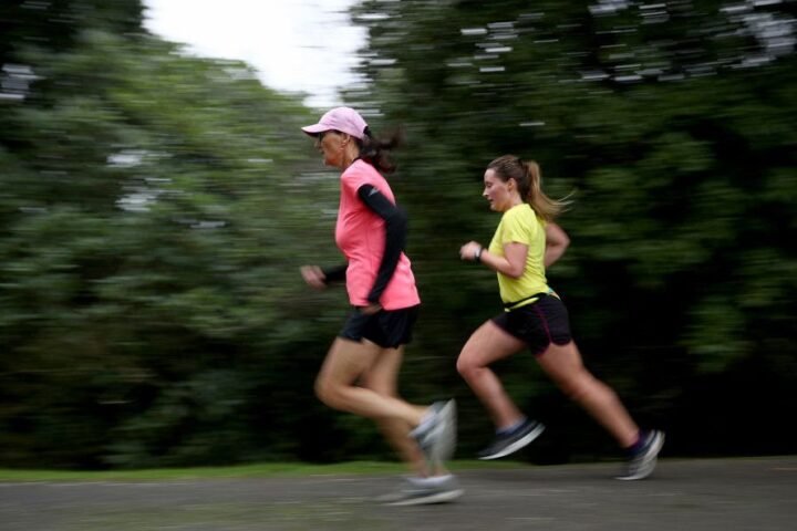 Two runners in a parkrun